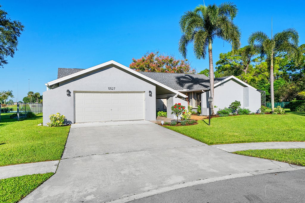 Photo of 5527 Adair Way, Lake Worth, FL 33467 (MLS # B26089474)