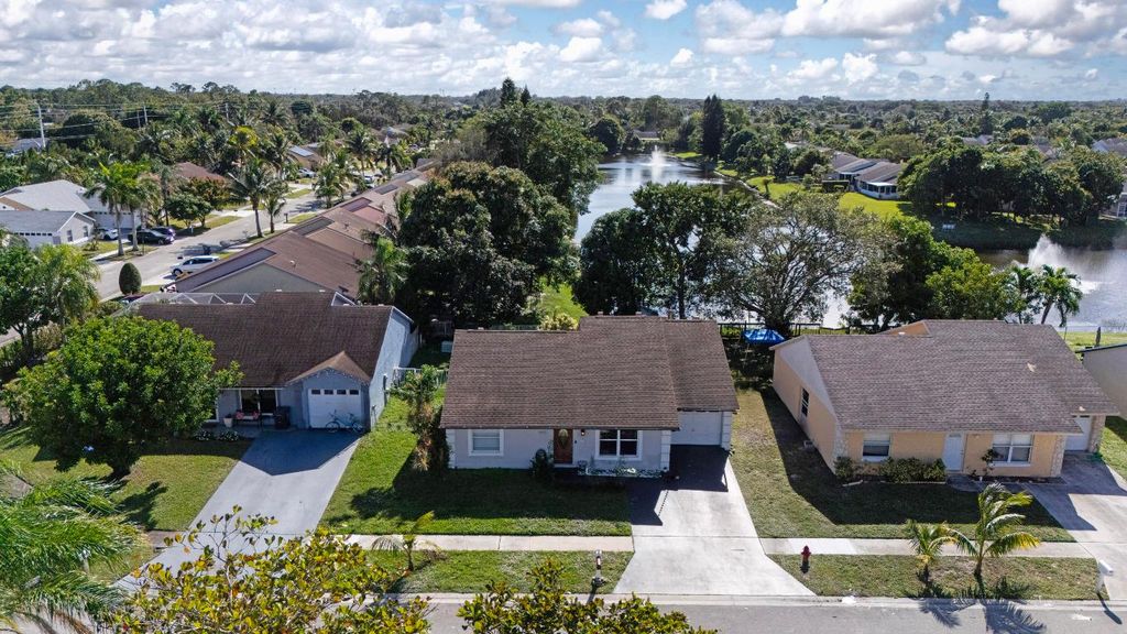 Photo of 5561 Priscilla Lane, Lake Worth, FL 33463 (MLS # R11149365)