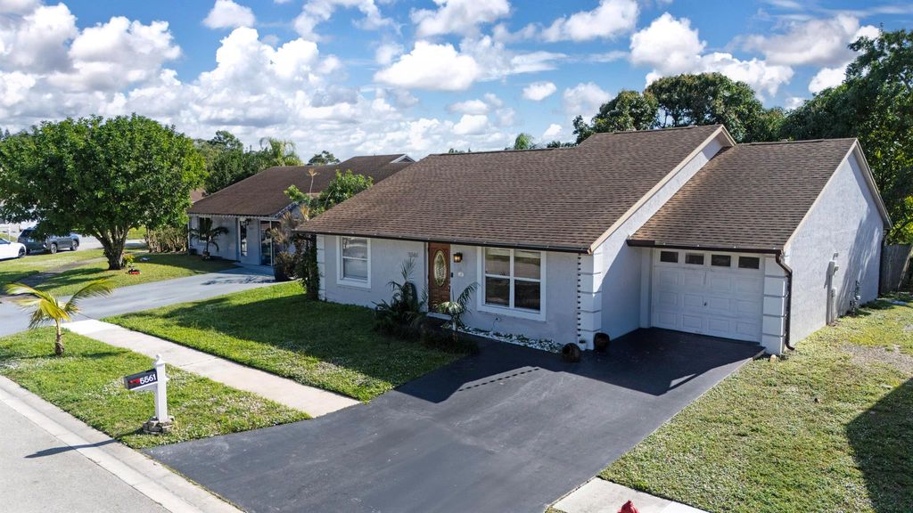 Photo of 5561 Priscilla Lane, Lake Worth, FL 33463 (MLS # R11149365)