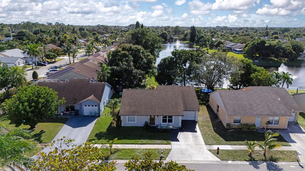 Photo of 5561 Priscilla Lane, Lake Worth, FL 33463 (MLS # R11149365)