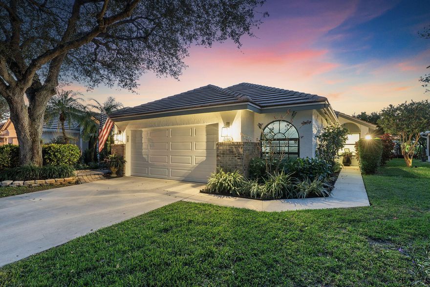 Looking for a peaceful waterfront home? Welcome to this totally renovated home with a stunning blend of modern sophistication, thoughtful design, and an abundance of natural light that fills every corner of this beautifully updated home. Carefully crafted under the guidance of an interior designer, this property exudes style, comfort, and functionality in equal measure. Step inside, and you'll immediately notice the sun-drenched, open-concept layout that creates a warm and inviting atmosphere. The kitchen is a chef's dream, showcasing quartz countertops, stainless steel appliances, perfect for hosting friends and family. And for those who love to cook, the gas stove takes culinary possibilities to the next level. Throughout the home, tiled and wood flooring, fresh neutral-toned paint, and designer-inspired finishes tie everything together with effortless elegance. The primary suite offers a true retreat, complete with a spa-inspired ensuite featuring dual vanities, a walk-in shower, and impeccable finishes. Two additional bedrooms provide versatility for family, guests, or even that home office you've been dreaming of. As much as there is to admire inside, the outdoor spaces take it to another level. The expansive west-facing patio is the ultimate spot to relax or entertain, offering beautiful lake views and magical sunsets that paint the sky with vibrant hues. Whether it's morning coffee or evening gatherings, this patio sets the stage for unforgettable moments. Practicality meets peace of mind with hurricane impact windows and doors throughout, ensuring both security and energy efficiency year-round. Newer roof, and newer water heater. Nestled in the sought-after Sherwood Forest community, this home also grants access to a sparkling pool, tennis courts, and serene walking paths. Plus, you're just minutes from the vibrant energy of Atlantic Avenue, pristine beaches, and top-rated private schools. This property isn't just a home, it's a lifestyle. Don't miss your chance to make it yours. Schedule your private showing today!