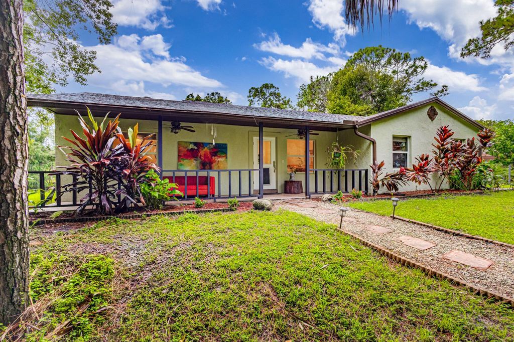 Photo of 13578 Edith Road, Loxahatchee Groves, FL 33470 (MLS # R10916687)