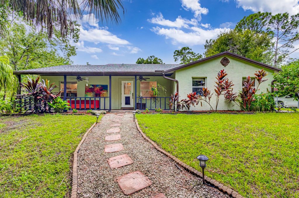 Photo of 13578 Edith Road, Loxahatchee Groves, FL 33470 (MLS # R10916687)