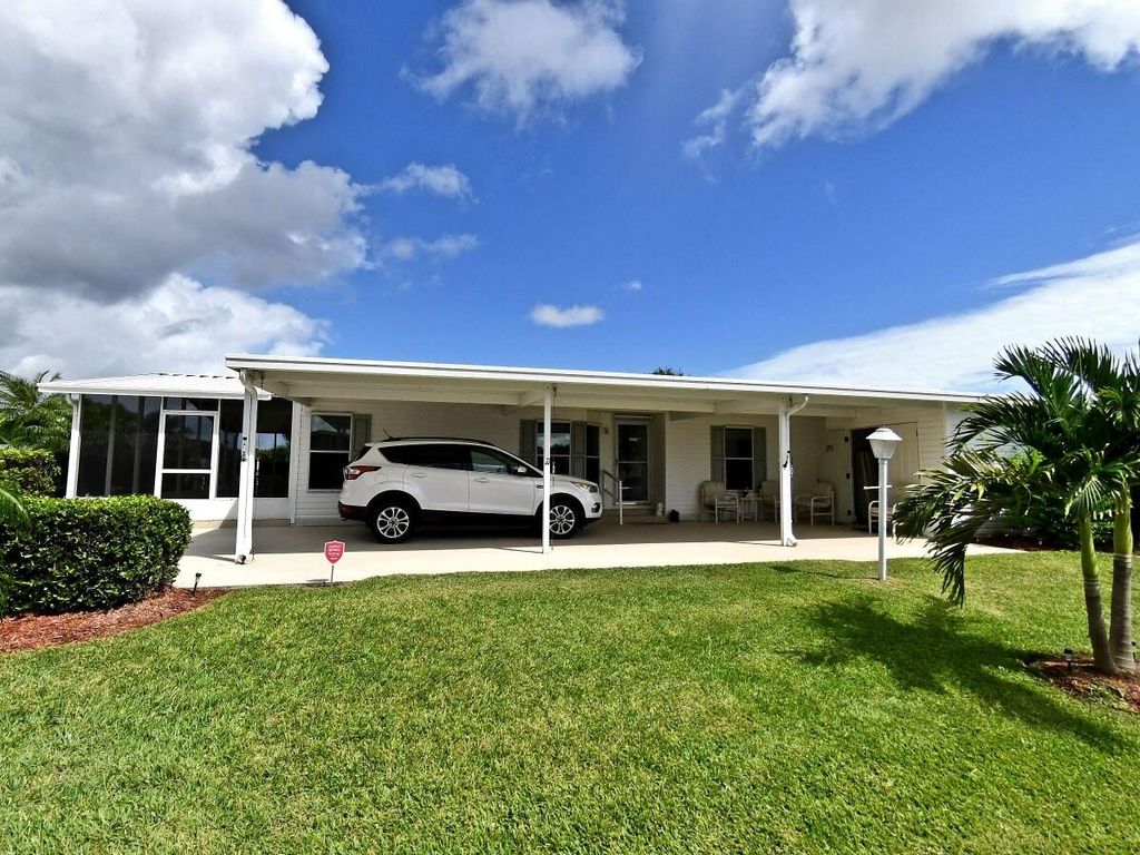 Photo of 2959 Eagle's Nest Way, Port Saint Lucie, FL 34952 (MLS # B26032388)
