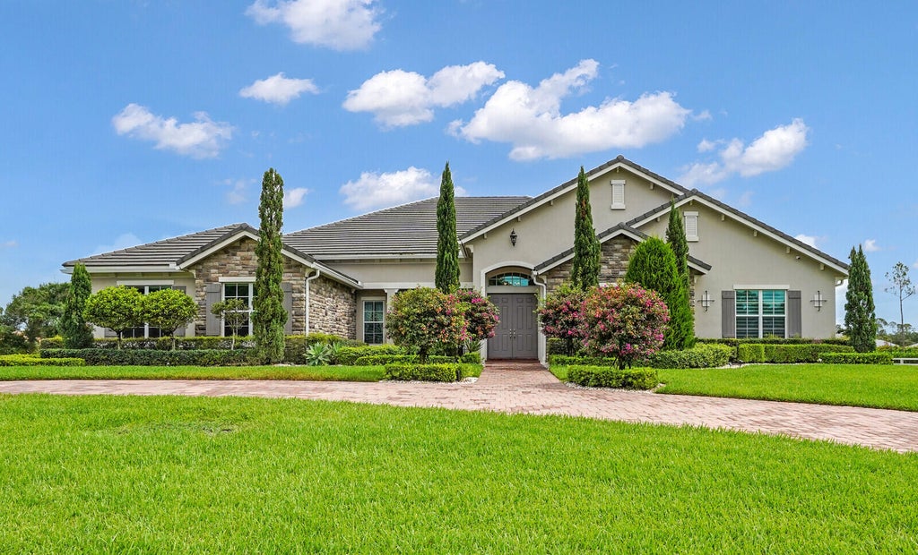 Photo of 10032 Calabrese Trail, Jupiter, FL 33478 (MLS # R11097306)