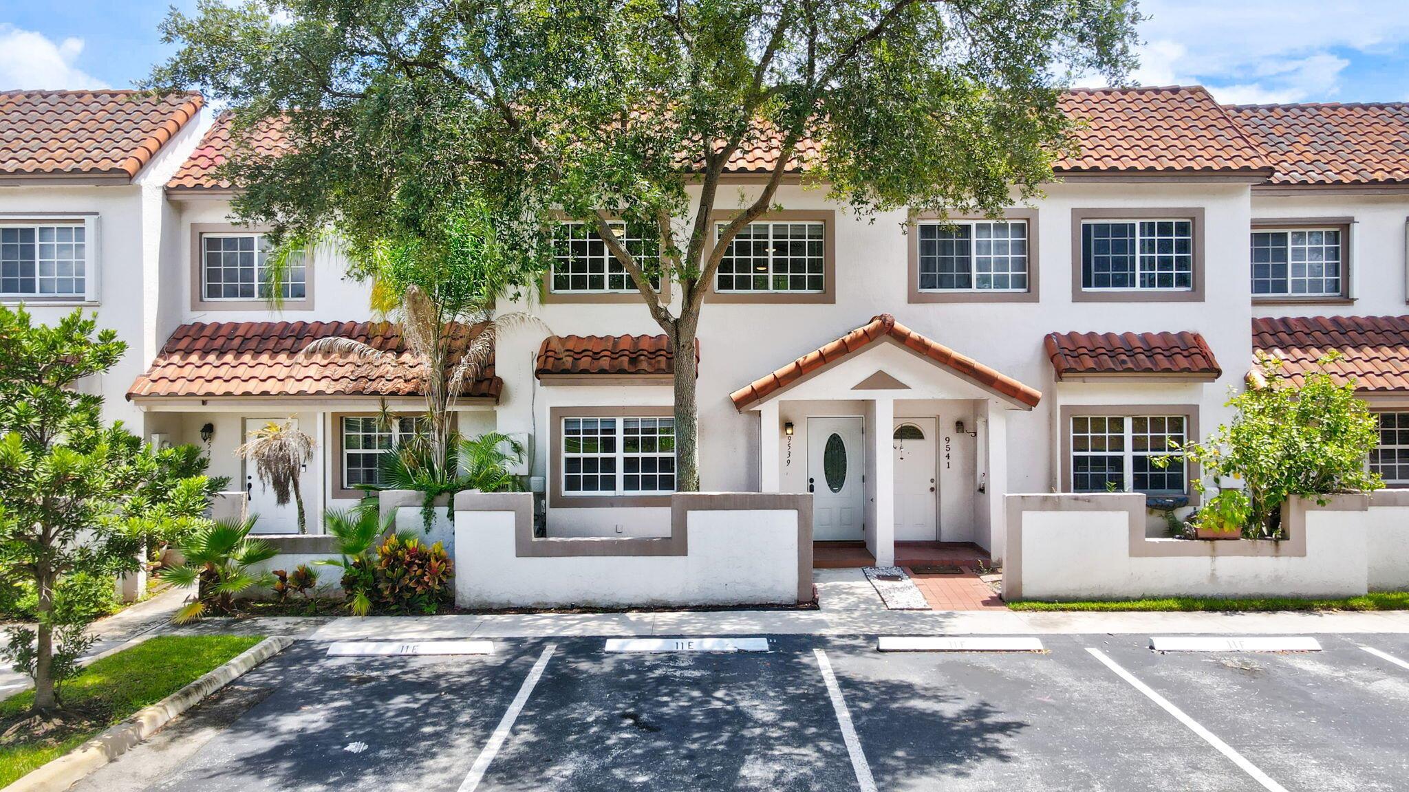 Beautifully renovated waterfront townhouse with a stunning brand-new kitchen featuring white shaker cabinets, quartz countertops, tiled backsplash, and stainless steel appliances. New elegant porcelain tile flooring on the main level; luxury vinyl plank upstairs and on the staircase. All bathrooms have been tastefully updated with designer tile, frameless glass showers, and modern fixtures. Thoughtfully chosen light fixtures add a stylish, upscale touch throughout. Enjoy serene lake views from the screened-in patio. Newer roof (2020). Laundry room with washing machine and dryer discreetly located on the patio. Low HOA covers lawn care, trash, pool, and cabana. Two assigned parking spaces plus ample guest parking. Convenient location. No rental restrictions-investor friendly!