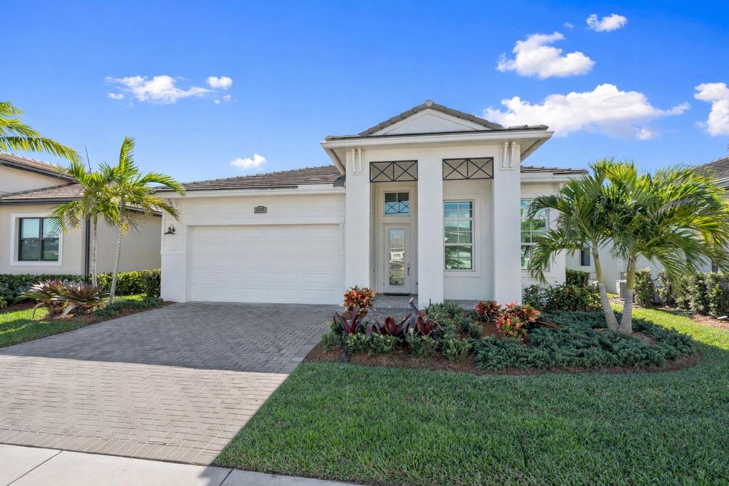 Photo of 2125 SE Mosaic Boulevard, Port Saint Lucie, FL 34984 (MLS # R11161003)