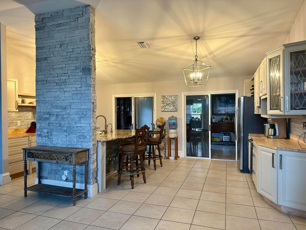 Photo of 982 SW Du Bois Avenue, Port Saint Lucie, FL 34953 (MLS # R10945938)