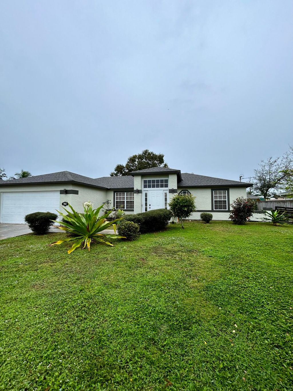 Photo of 982 SW Du Bois Avenue, Port Saint Lucie, FL 34953 (MLS # R10945938)