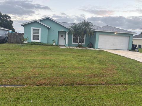 Photo of 1049 SW Jacqueline Avenue, Port St Lucie, FL 34953 (MLS # R11134678)