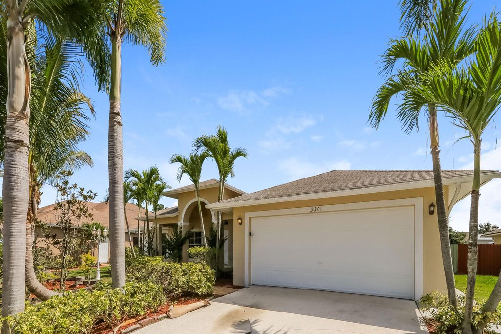 Photo of 3301 SW Mcmullen Street, Port Saint Lucie, FL 34953 (MLS # R10985821)