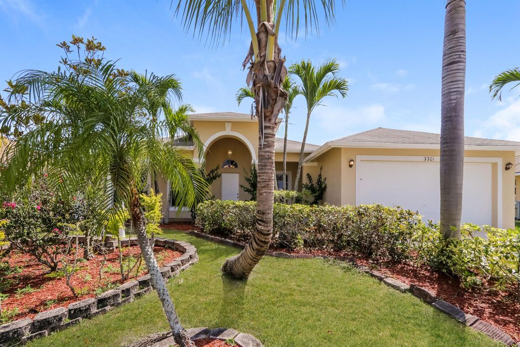 Photo of 3301 SW Mcmullen Street, Port Saint Lucie, FL 34953 (MLS # R10985821)