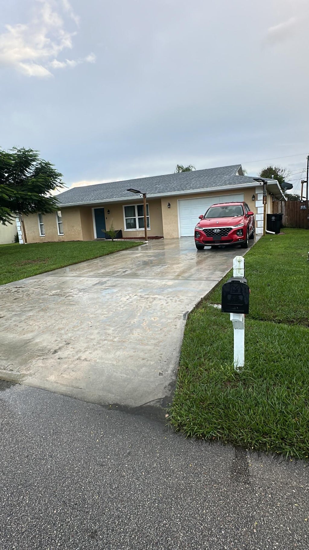 Photo of 150 SE Duval Avenue, Port Saint Lucie, FL 34983 (MLS # B26078942)