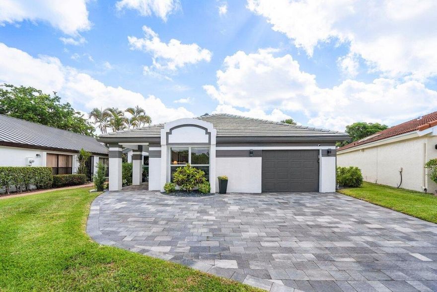 Motivated seller -This well designed meticulous home has been completely renovated. The attention to detail is evident in every corner. The finishes and all materials used are top of line, including all of the Appliances, AC, Bathroom & Kitchen fixtures, Floors, CGI Impact windows, lighting and more.  The Vaulted ceilings create a sense of spaciousness and warmth throughout. The expanded kitchen is a Chef's delight. The home is protected with a whole house generator and inground propane tank. All work was done for the owner, by licensed contractors and permitted.
Boca Woods is a country club you want to live in. Our ratio of homes to Golf holes is amongst the best. The two championship courses have been incredible maintained, and our signature "The Woods" course has recently been redesigned by famed Golf Architect Reese Jones. The practice facility is a big draw. The range has "Top Tracer" technology, large chipping areas and putting greens that are consistent with the course's greens. Boca Woods does not have a waiting list, so all new owners can hit the links they day they join!
Boca Woods' new fitness center and Spa rival all others. Whether you're warming up for Golf, Tennis or Pickelball, taking classes or stretching on the Pilates reformers, the gym has everything you need. The inhouse PT professionals & Trainers are there to make your experience the most beneficial. All you need is your Clothing, Clubs and Racquets and enjoy the best of Country Club living!