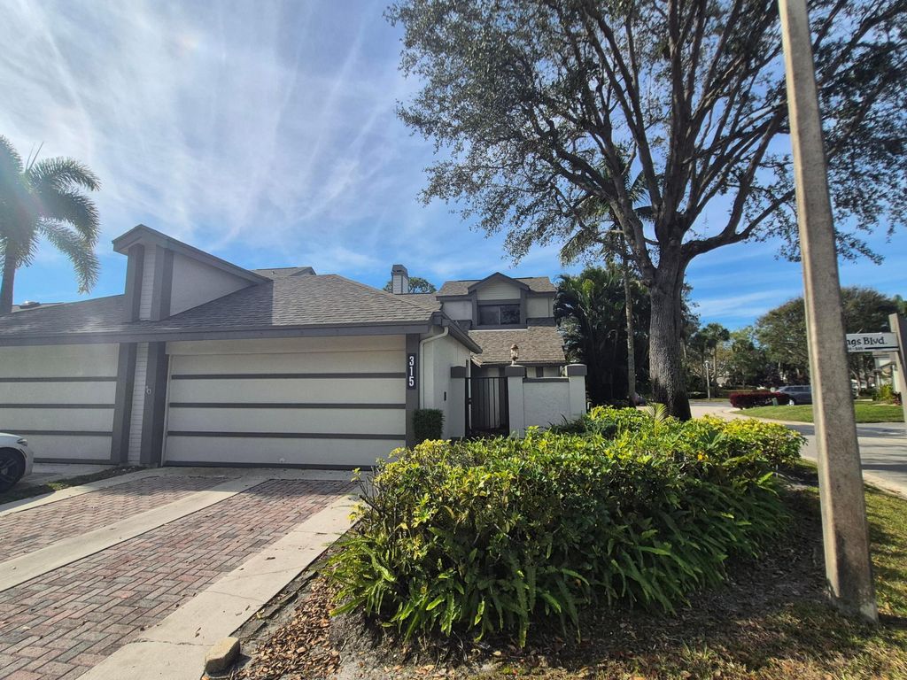 Photo of 315 Landings Boulevard, Greenacres, FL 33413 (MLS # R11056999)