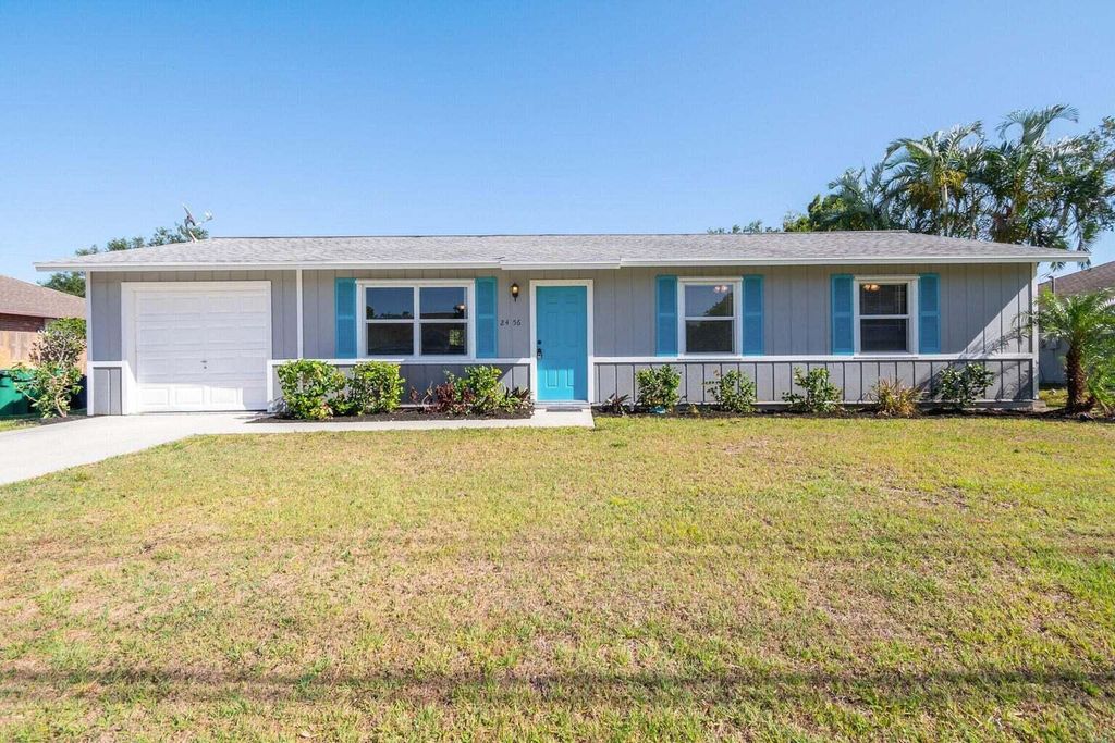 Photo of 2456 SE Melaleuca Boulevard, Port St Lucie, FL 34952 (MLS # R10897821)