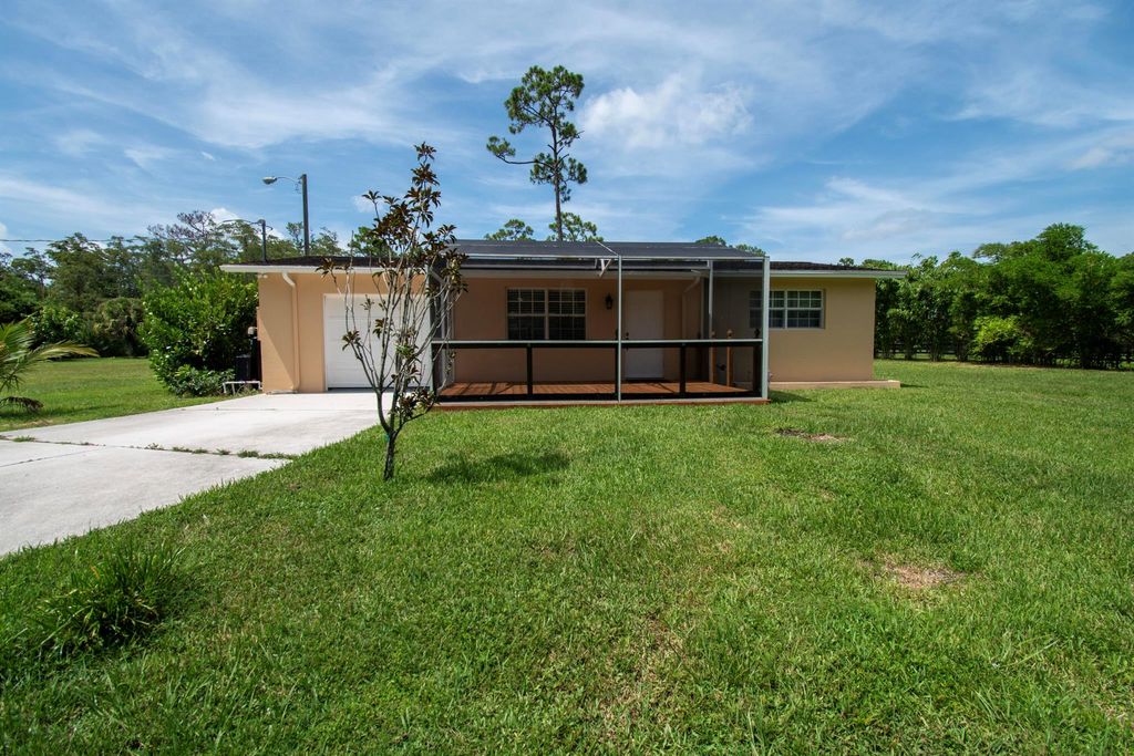 Photo of 13152 Casey Road, Loxahatchee Groves, FL 33470 (MLS # R11111698)