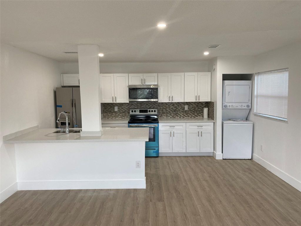 Photo of 4121 Stirling Road #401, Dania Beach, FL 33314 (MLS # B26021158)