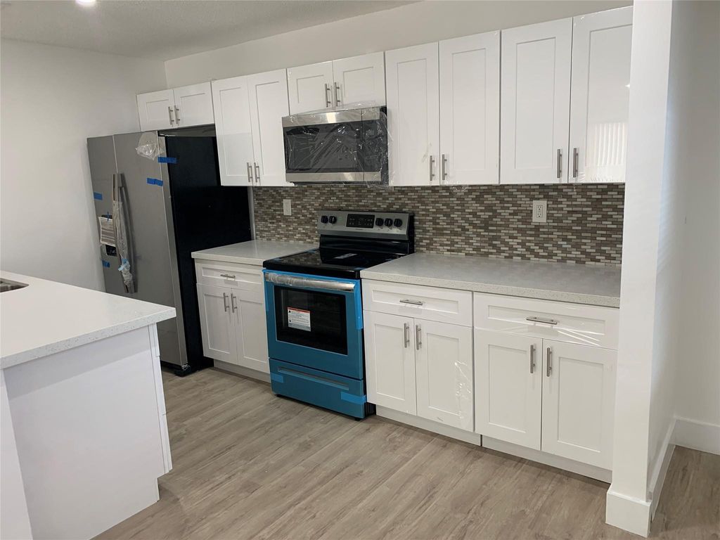 Photo of 4121 Stirling Road #401, Dania Beach, FL 33314 (MLS # B26021158)
