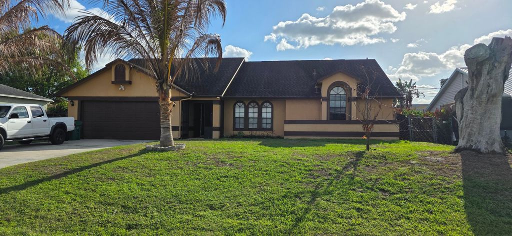 Photo of 2722 SW District Avenue, Port Saint Lucie, FL 34953 (MLS # B26010152)