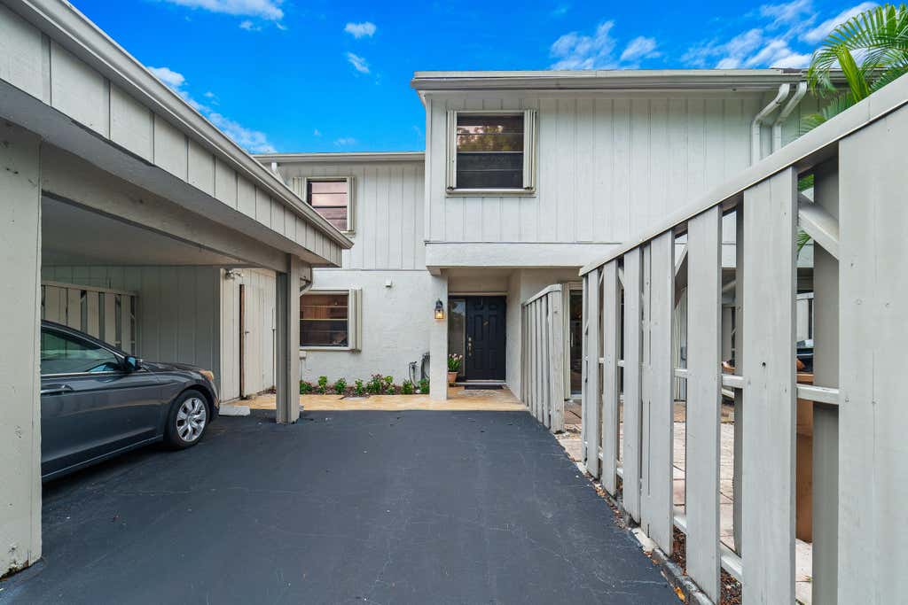 Photo of 219 Wildwood Circle, Deerfield Beach, FL 33442 (MLS # B26060218)