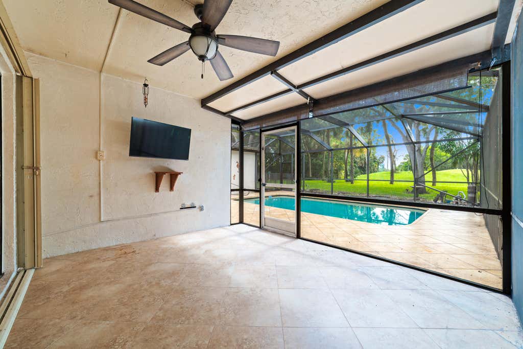Photo of 219 Wildwood Circle, Deerfield Beach, FL 33442 (MLS # B26060218)