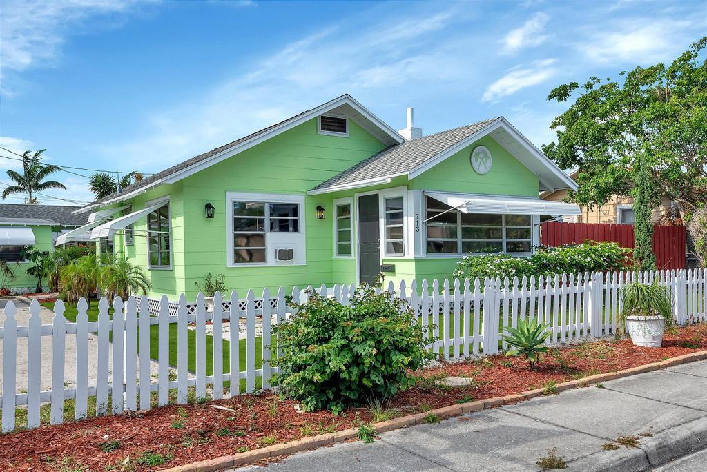 Historic Lake Worth Beach single family home with detached cottage. Perfect for an owner occupant or as an investment opportunity with substantial income potential. The main house is 2 bedrooms and 1 bath, with new laminate floors throughout. Its spacious dining and living room lead through the kitchen and out to a large fenced in yard with plenty of room for a pool. The charming detached studio cottage is complete with a kitchen, bathroom, living room/ bedroom and its own outdoor space. Both units have separate gas &electric meters, access to an on-site washer and dryer and off street parking. Property is blocks to downtown, a few minutes to the beach and centrally located in Palm Beach County. Both units are currently tenant occupied.