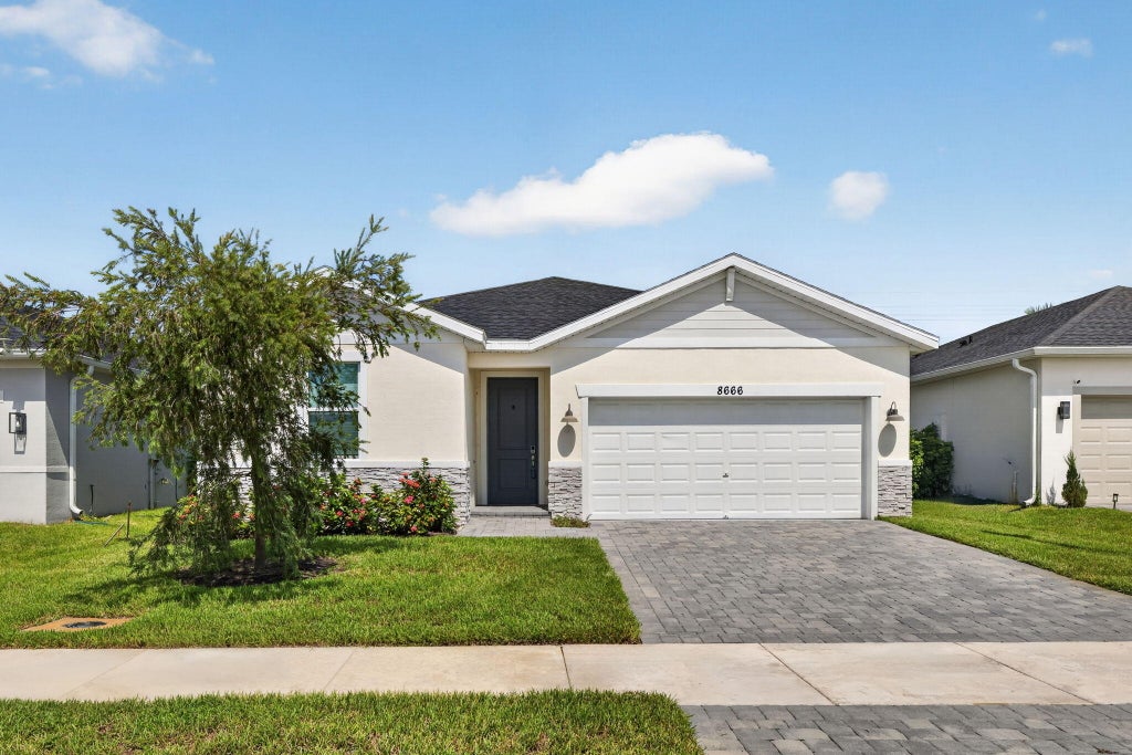 Photo of 8666 DAHLIA Circle, Port Saint Lucie, FL 34986 (MLS # B26092599)