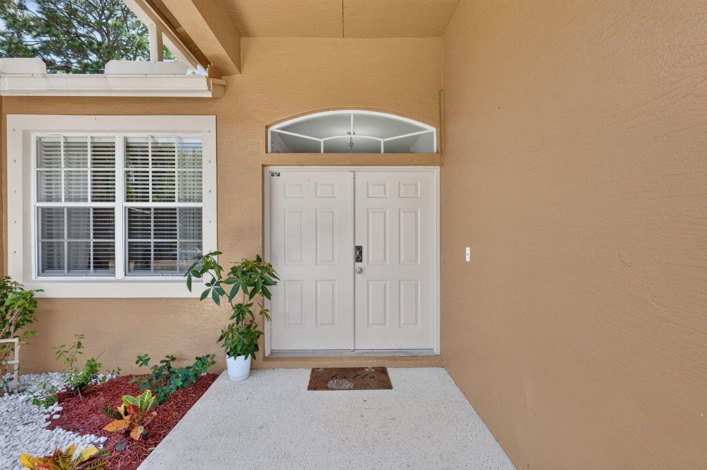 Photo of 7907 Winter Garden Parkway, Fort Pierce, FL 34951 (MLS # B26076484)