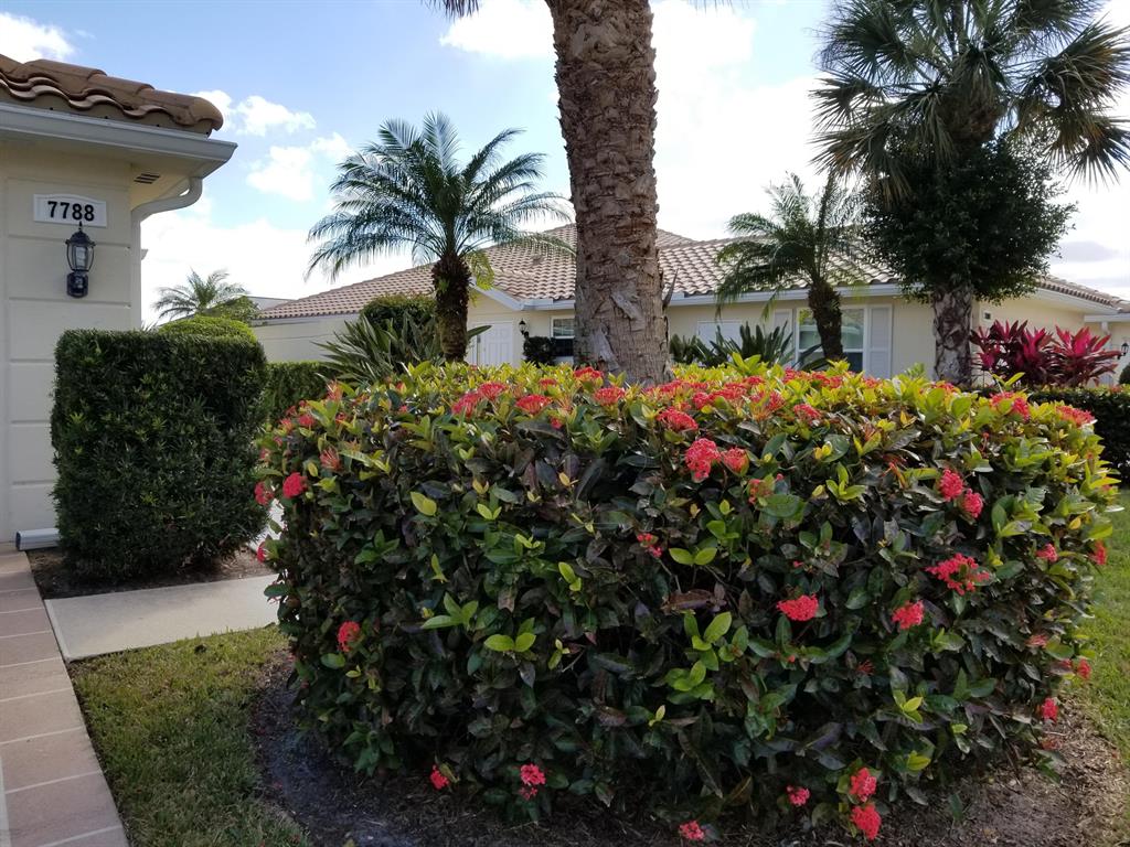 This two bedroom, two bath villa is ideally situated in Lost Lake Golf Club. This property offers beautiful lake views from its screened lanai and is freshly painted with new laminate flooring in the bedrooms and living area. A laundry room and two-car garage make this the perfect rental. One small pet is permitted with a non-refundable pet deposit and owner's approval. Pick-up trucks are allowed, but must be garaged at all times. Lost Lake is located in Hobe Sound and is a short distance to Stuart , Tequesta, and Jupiter.
