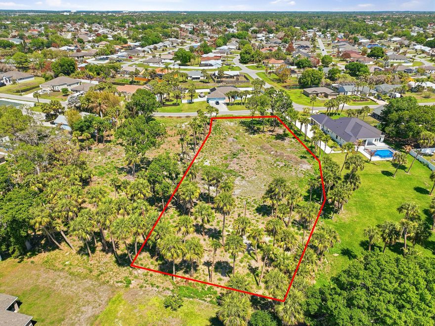 Rear find! One of a kind Estate Lot/ Parcel located in a highly desirable area of Port St. Lucie. This just over one acre parcel is adjacent to another just over one acre lot providing many growth opportunities The current Zoning permits allow for Residential housing, Assisted Living, Schoolhouse, Group Home or Rehabilitation Facility. Re-zoning with city approval would allow a secondary structure (guest house, workshop or a large garage). Just minutes away from shopping, schools, restaurants, hospitals, I-95, the turnpike, City park & boat ramp within a block of the parcels. City water & sewer available. Seller prefers to sell to someone looking to build a larger then 4,000 sq ft home. Seller is a builder. Cleared & dry land.