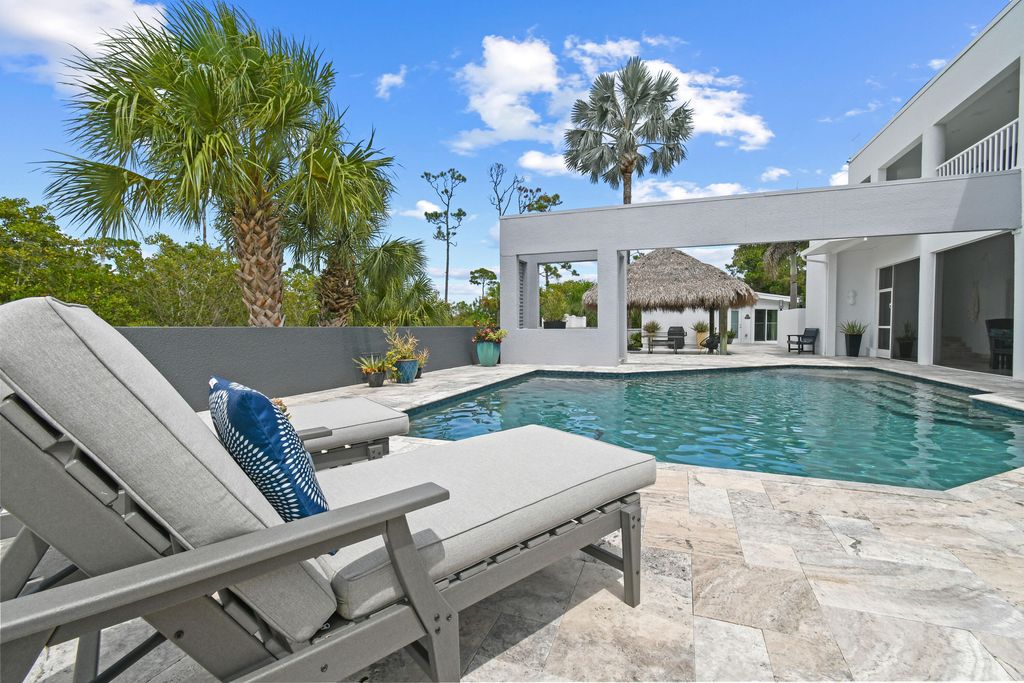 Photo of 10561 SE Le Parc, Tequesta, FL 33469 (MLS # B26027279)