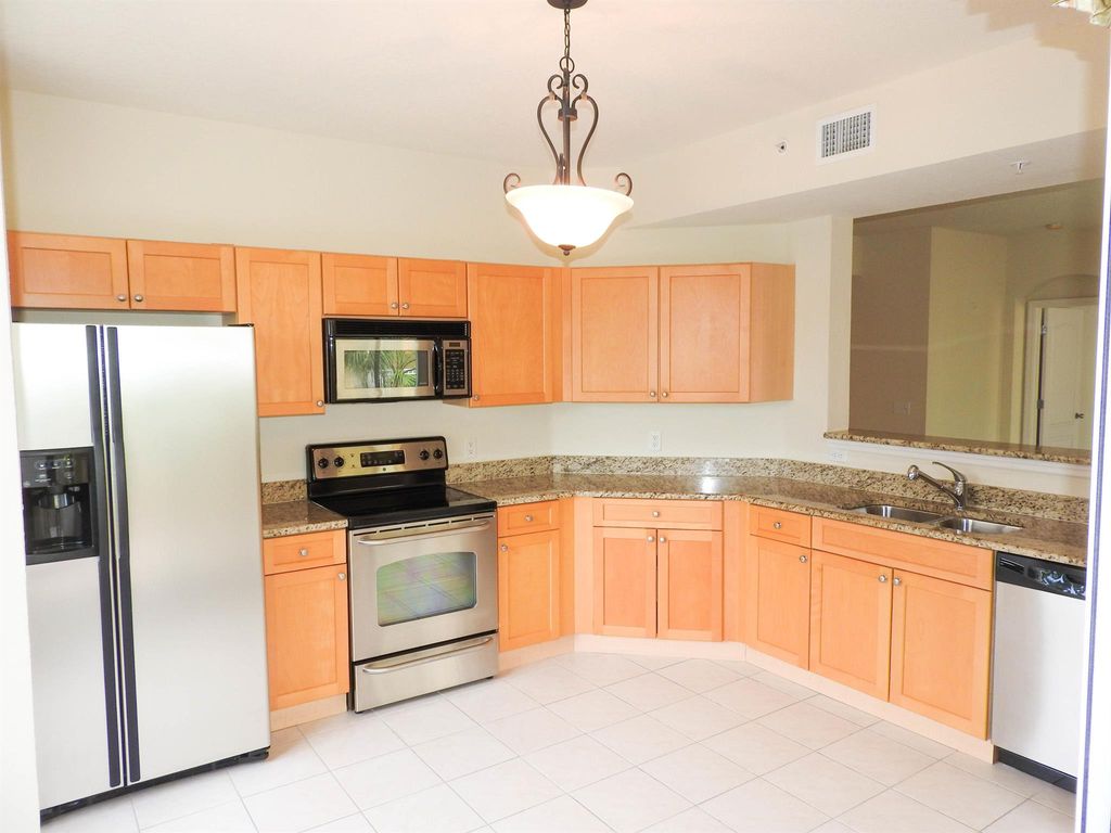 Photo of 11014 Legacy Drive #203, Palm Beach Gardens, FL 33410 (MLS # R10914978)