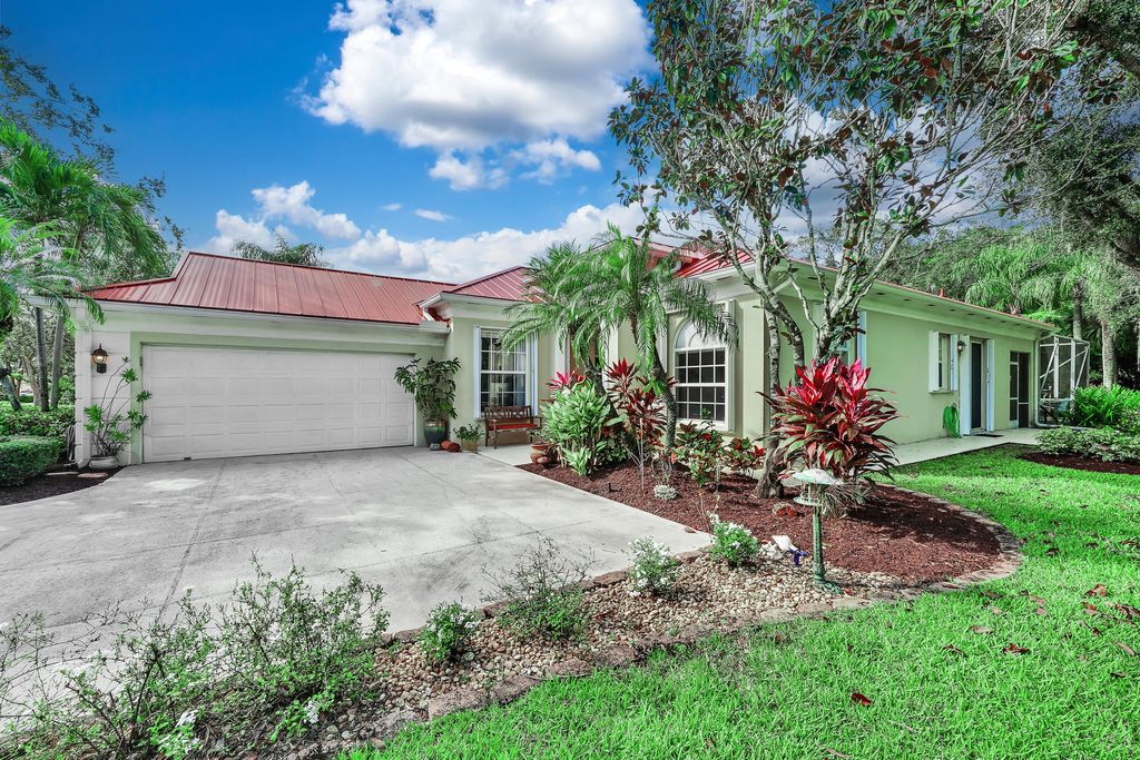 Photo of 1201 SW Eagleglen Place, Stuart, FL 34997 (MLS # R11036665)