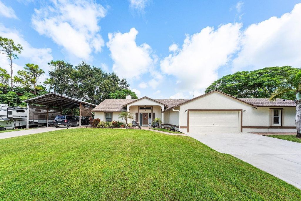 Photo of 15703 72nd Court N, The Acreage, FL 33470 (MLS # R11130810)