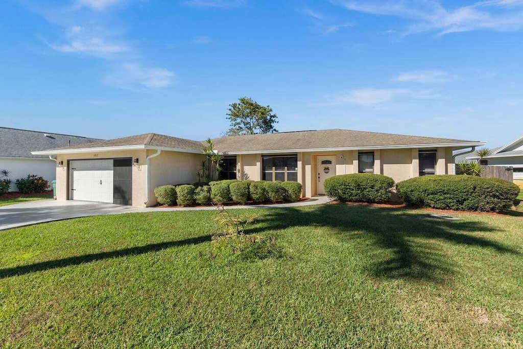 Photo of 1017 SE Walters Terrace, Port Saint Lucie, FL 34983 (MLS # B26063891)
