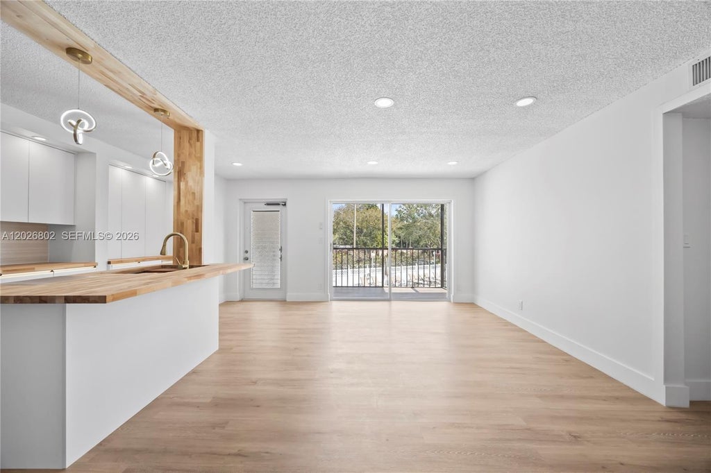 Photo of 7511 S Oriole Boulevard #201, Delray Beach, FL 33446 (MLS # A12026802)