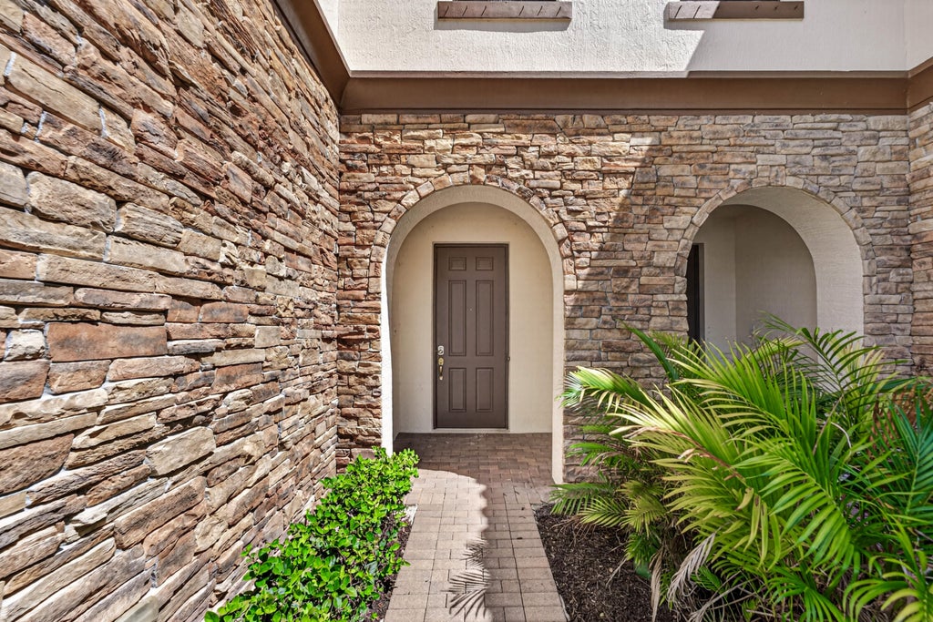 Photo of 10306 WELLINGTON PARC Drive, Wellington, FL 33449 (MLS # B26069804)