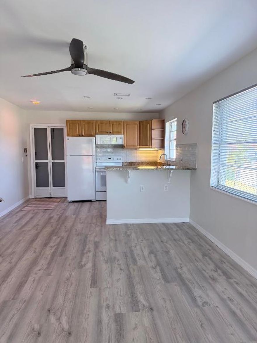 UNFURNISHED RENTAL 55+ Active Community in Highly Desirable Community in VISTA PINES CONDO. This stunning 2nd floor completely renovated corner unit offering 2 spacious bedrooms and 2 modern bathrooms. NO PETS! This OPEN concept unit features newer appliances, newer A/C and new floors. The kitchen flows seamlessly into the living and dining area creating a bright and airy space ideal for entertaining or relaxing. Heated pool This move in ready Gem is close to shopping, 4 minutes to Hutchinson Island. Near US1 and close to I95 and Florida Turnpike.