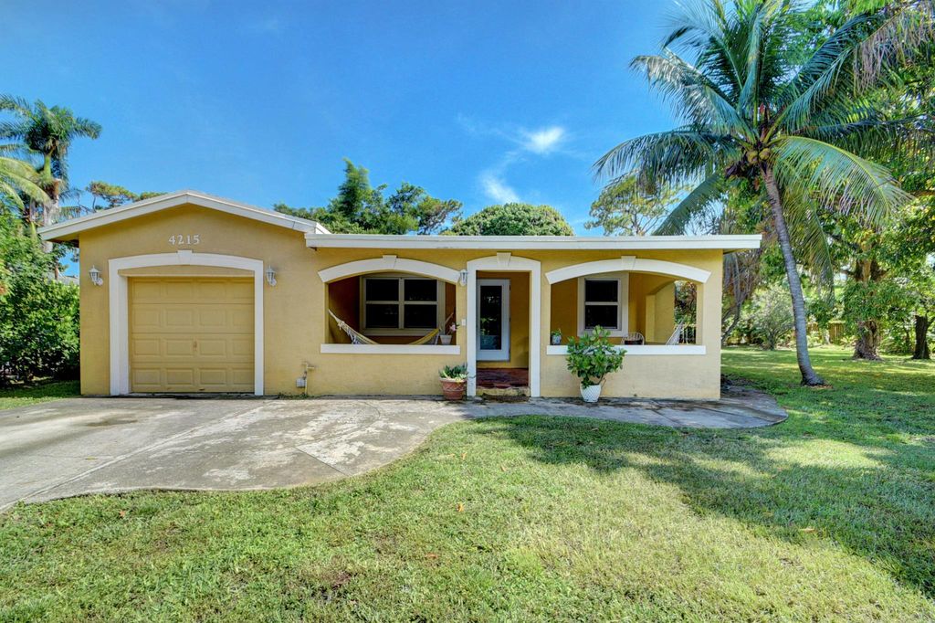 Photo of 4215 Sally Lane, Palm Springs, FL 33461 (MLS # R10905435)