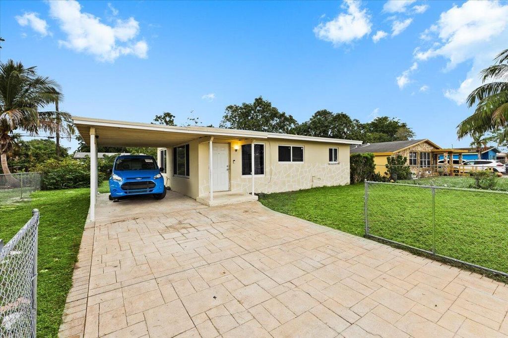 Photo of 1770 NW 26th Avenue, Fort Lauderdale, FL 33311 (MLS # R11147073)