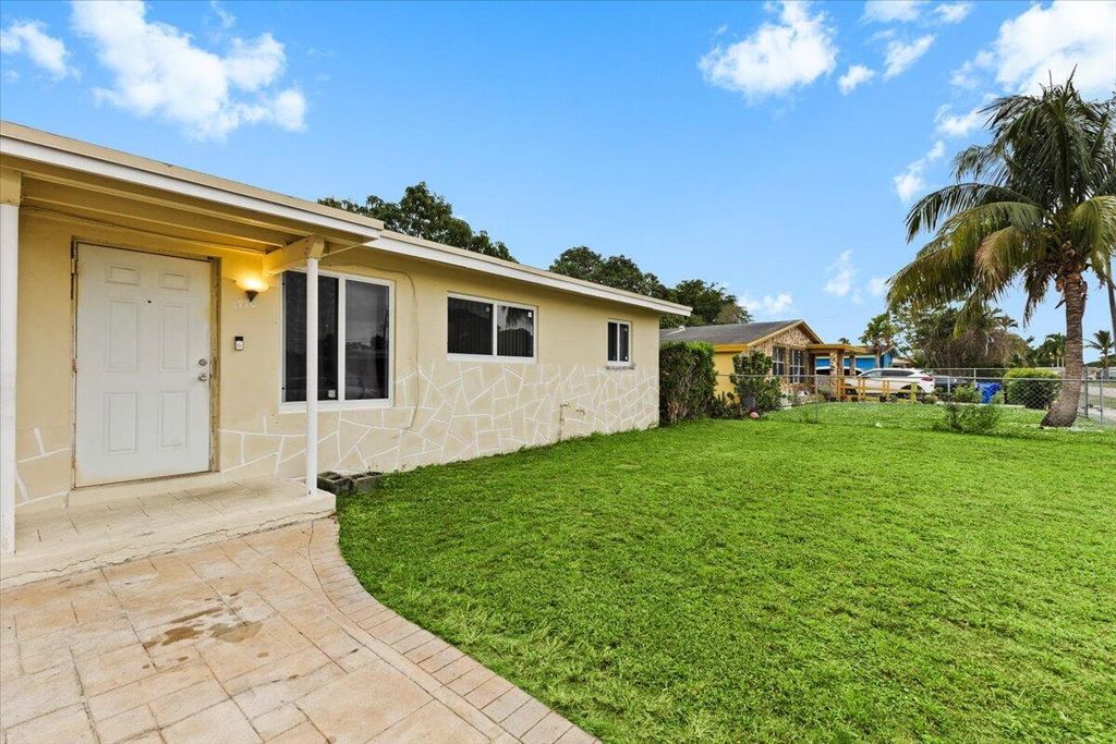 Photo of 1770 NW 26th Avenue, Fort Lauderdale, FL 33311 (MLS # R11147073)