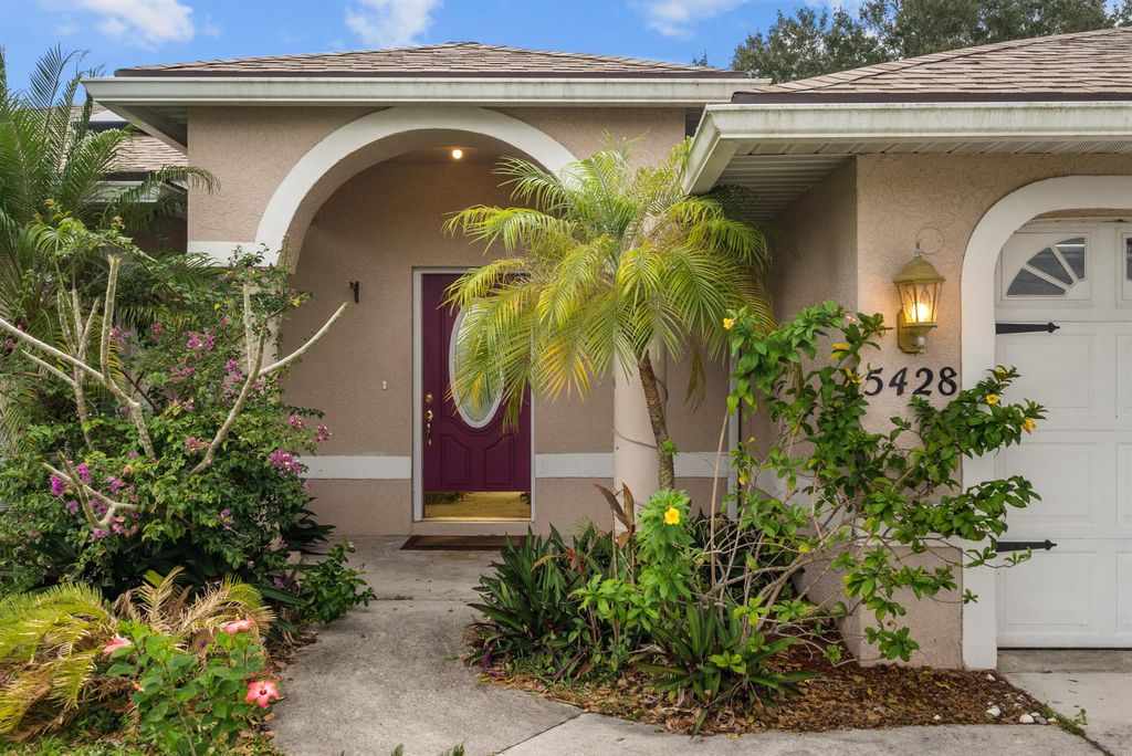 Photo of 5428 NW Edgewater Avenue, Port Saint Lucie, FL 34983 (MLS # R10951638)