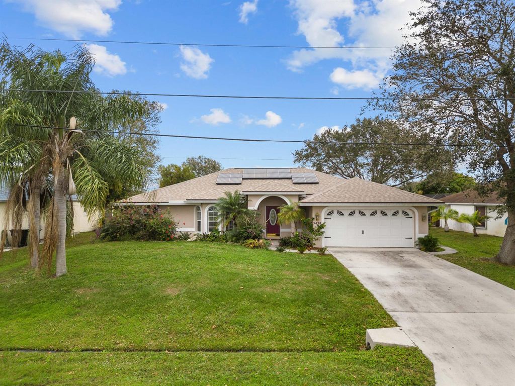 Photo of 5428 NW Edgewater Avenue, Port Saint Lucie, FL 34983 (MLS # R10951638)