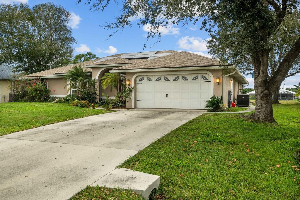 Photo of 5428 NW Edgewater Avenue, Port Saint Lucie, FL 34983 (MLS # R10951638)