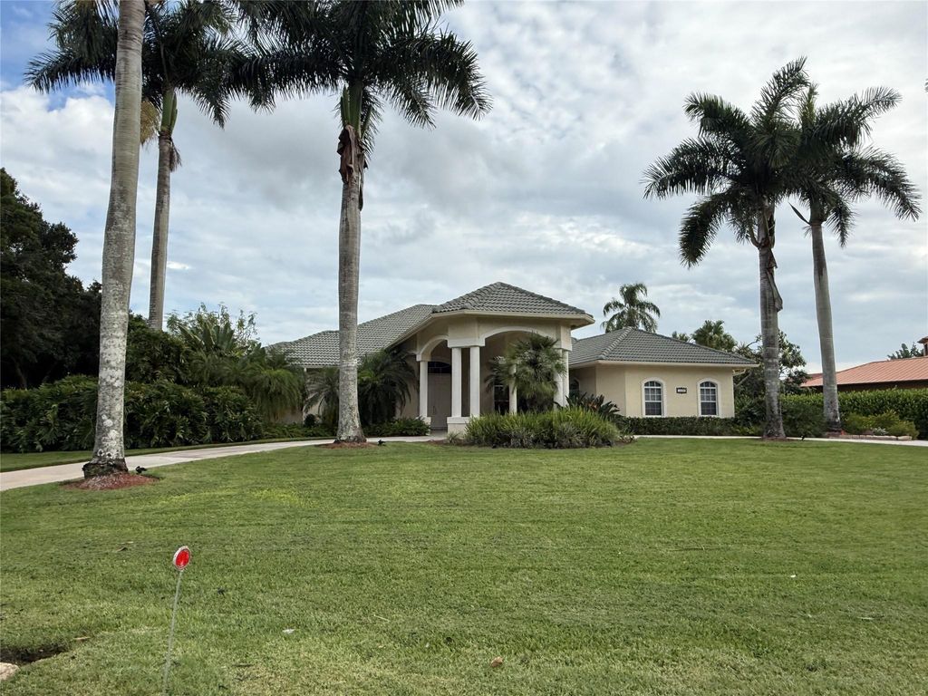Photo of 15630 Lindbergh Lane, Wellington, FL 33414 (MLS # F10555201)
