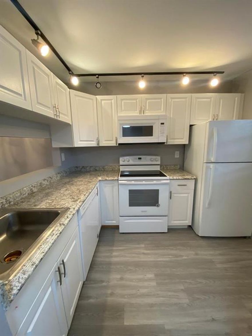 Ground floor 2 bed 2 bath renovated unit with an upgraded kitchen and baths, wood laminate floors, interior laundry closet and screened patio with lake view. All ages welcome. Community pool. Good location close to major roads, schools, shopping and dining.