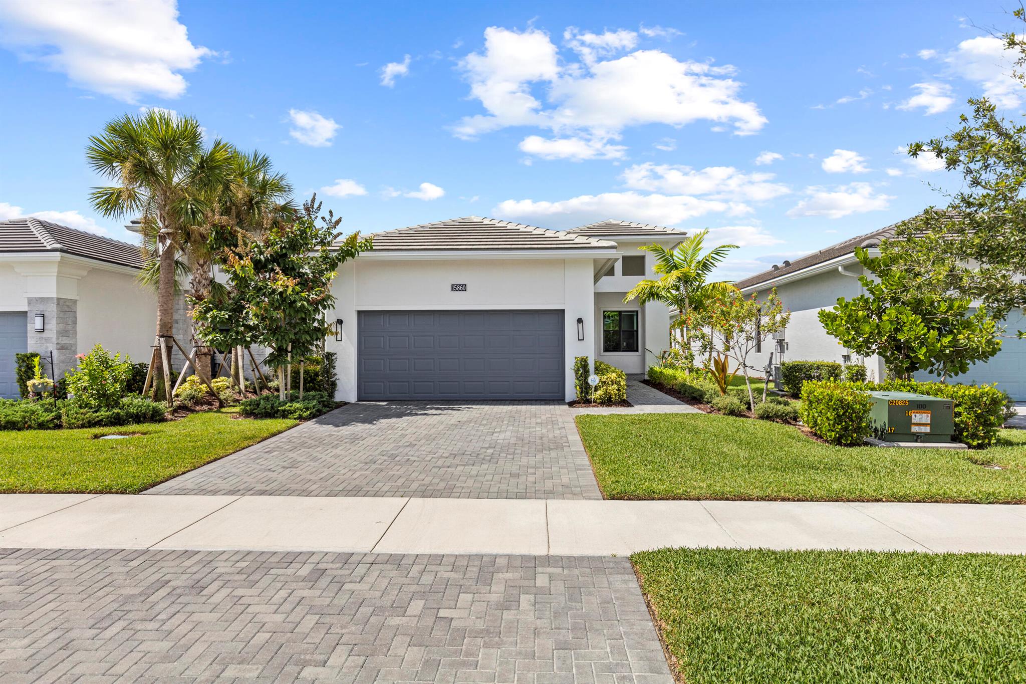 Welcome to your dream home in the vibrant Cresswind Palm Beach active adult community in Westlake. 2 Bedroom and 2 baths with a den and a large 2 car garage. Chefs' kitchen with 40-inch cabinets, quartz countertops, stainless steel appliances and a gas stove for the picky chefs. Home is spacious with a split floor plan, Lido model. Primary suite has 2 primary closets, double quartz vanities, walk in shower. The home is immaculate, just the way it came from the builder and of course all impact windows and all of the builder warranties, tiled throughout. Rear patio is paved and equipped with electric and water for an outdoor kitchen if desired. Westlake community has a lot of resort like amenities to offer. Make an appt today to see it and the community.