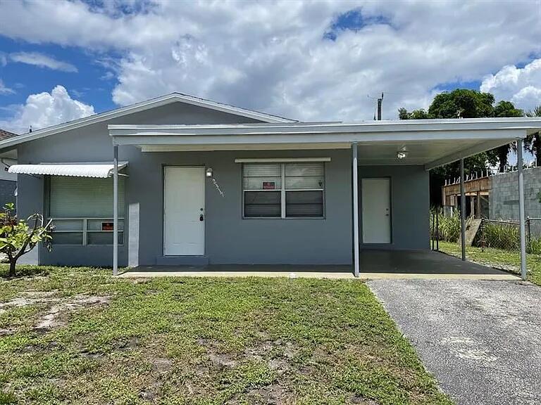 Photo of 2317 NW 6th Place, Fort Lauderdale, FL 33311 (MLS # B26047090)