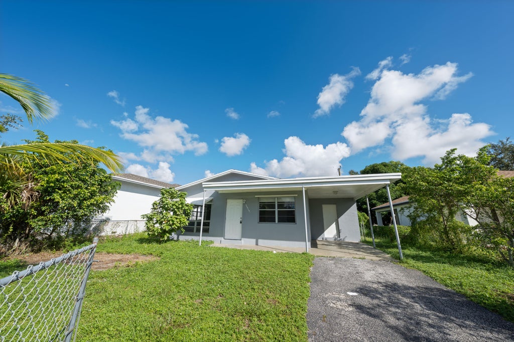 Photo of 2317 NW 6th Place, Fort Lauderdale, FL 33311 (MLS # B26047090)